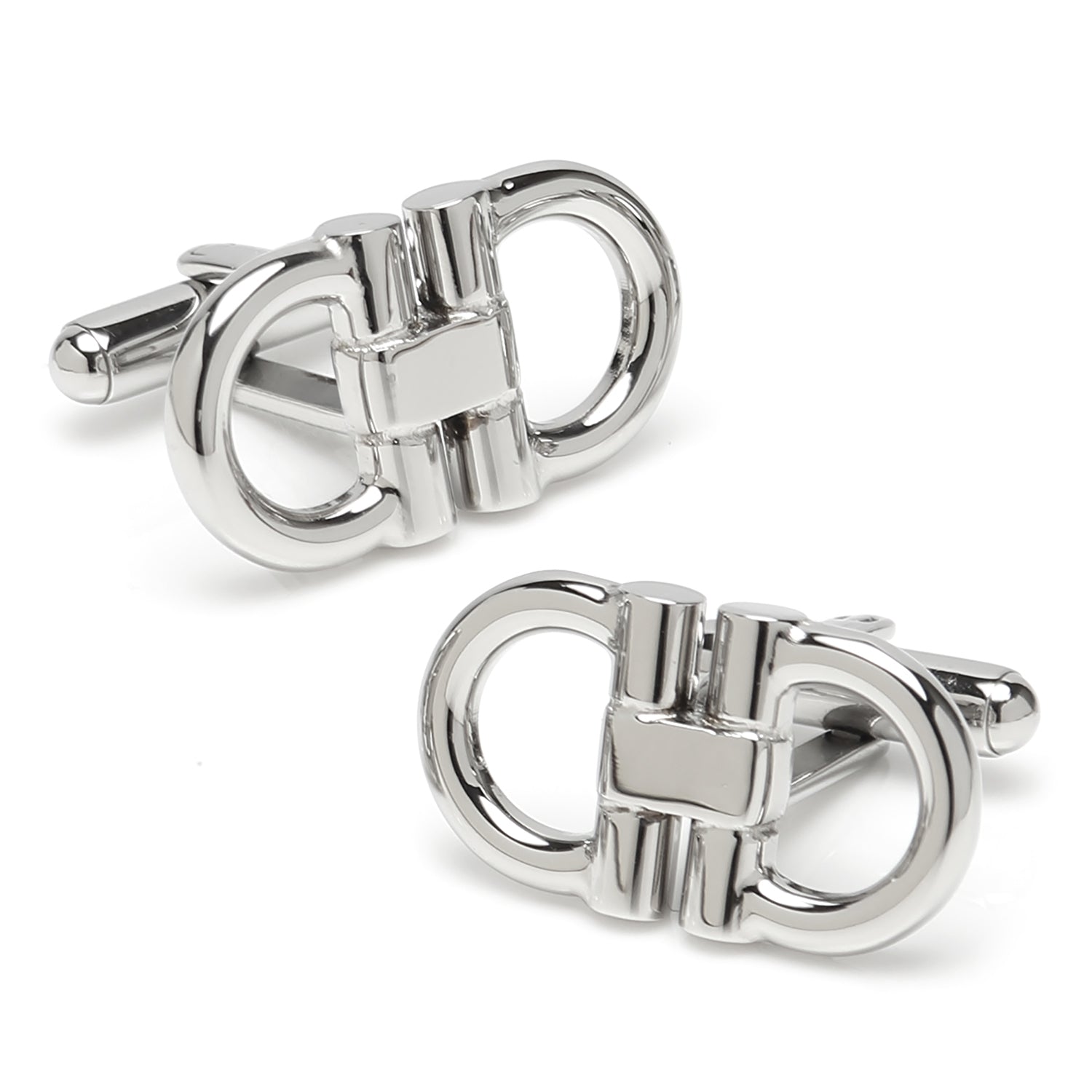 Pair of silver cufflinks on a white background