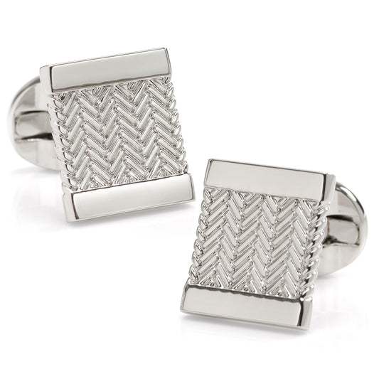 Pair of silver cufflinks with a chevron pattern on a white background