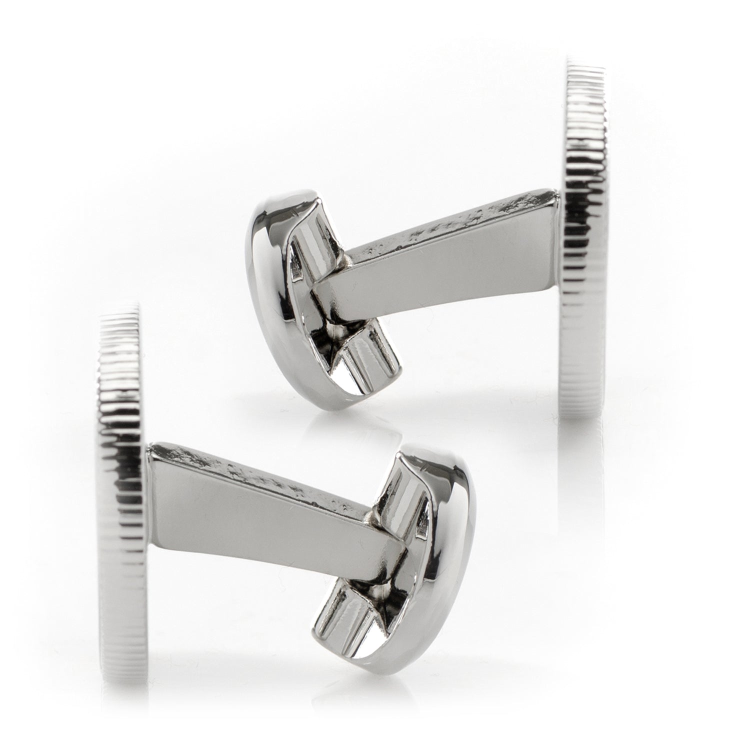 Silver cufflinks on a white background