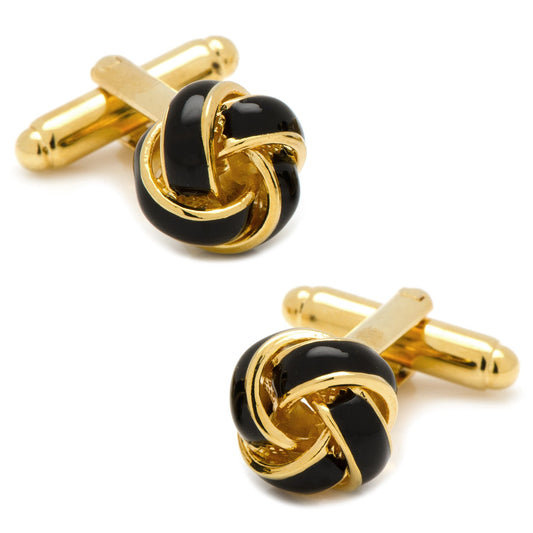Gold and black knot cufflinks on a white background