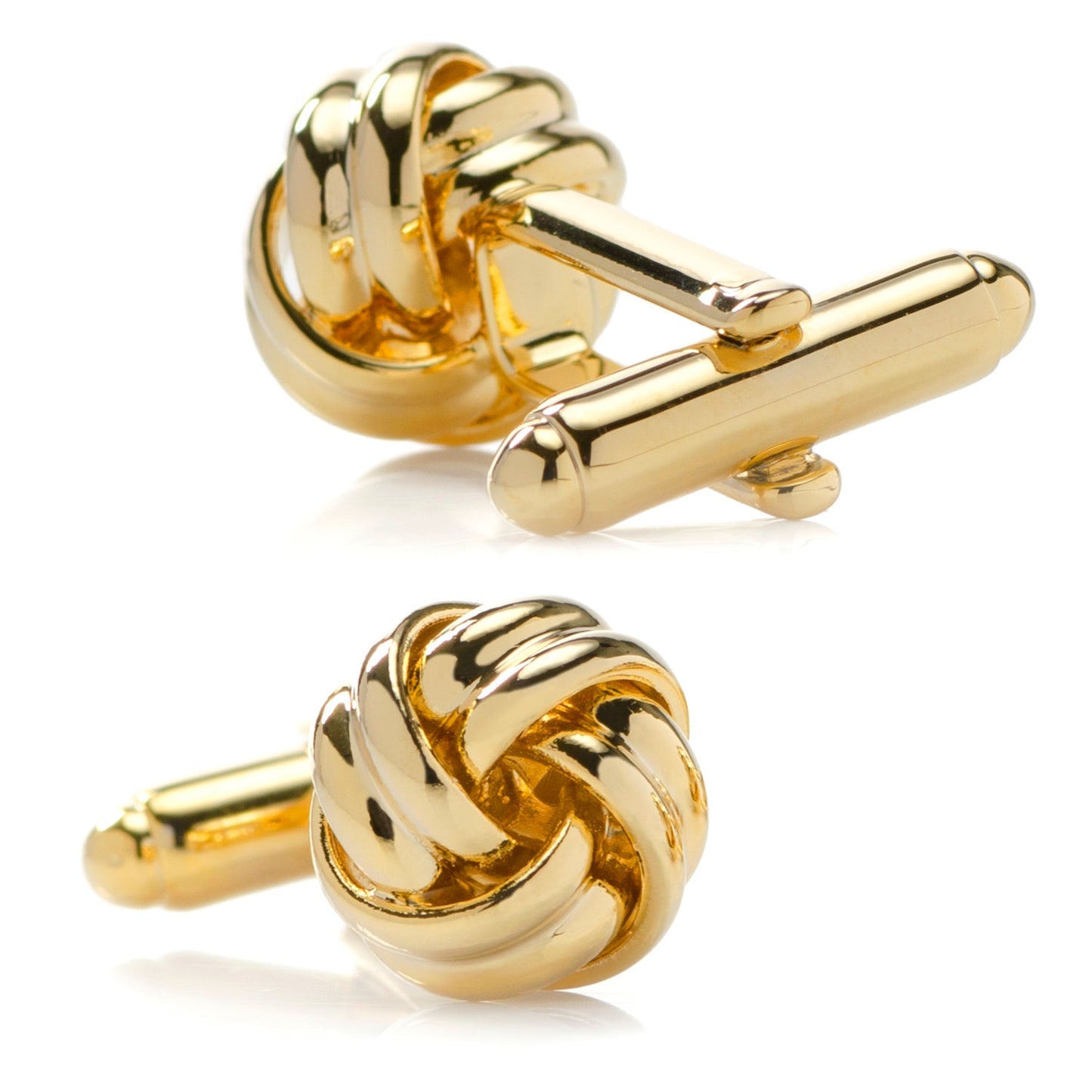 Gold knot cufflinks on a white background