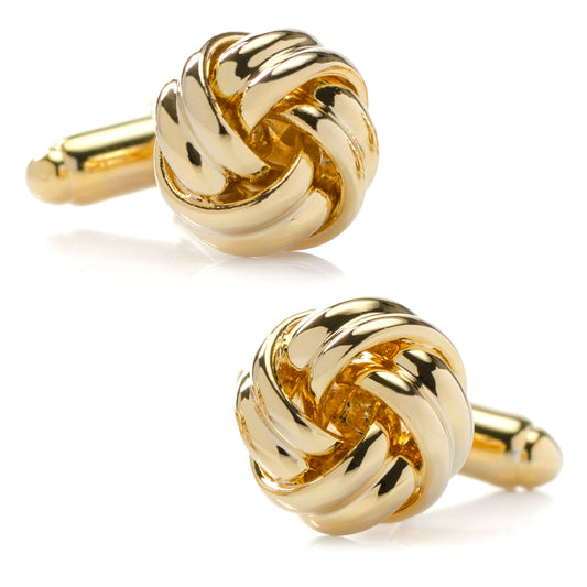 Pair of gold knot cufflinks on a white background