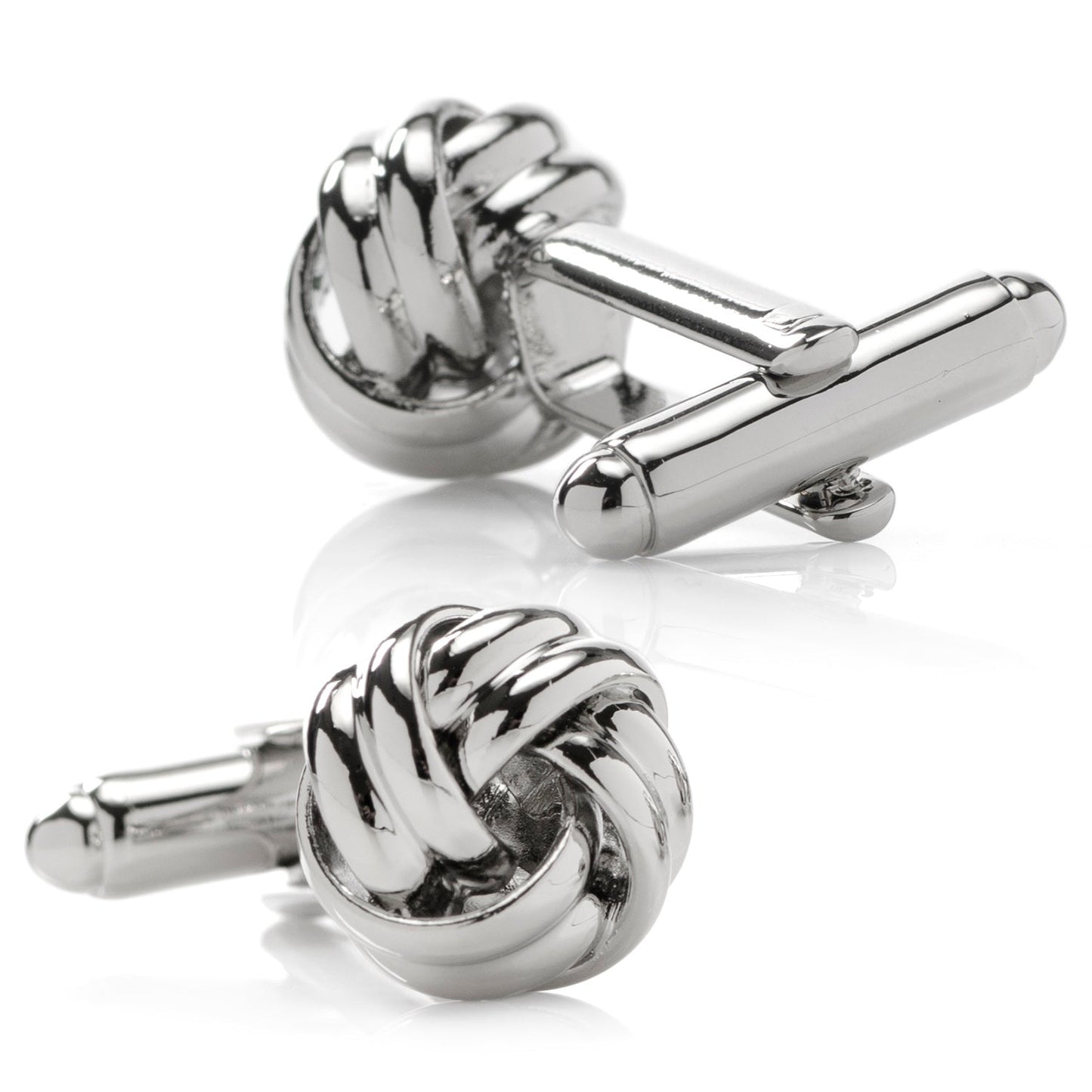 Silver knot-shaped cufflinks on a white background