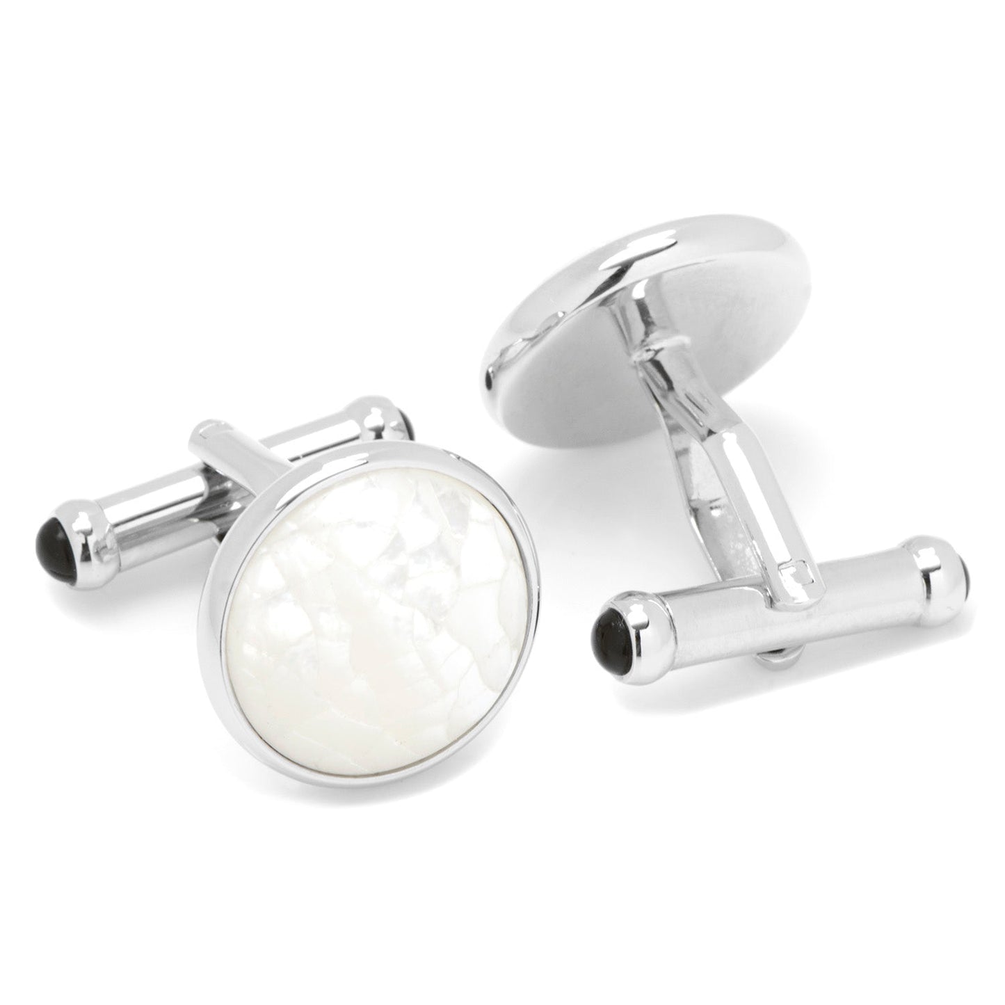 Silver cufflinks with a white circular stone on a white background