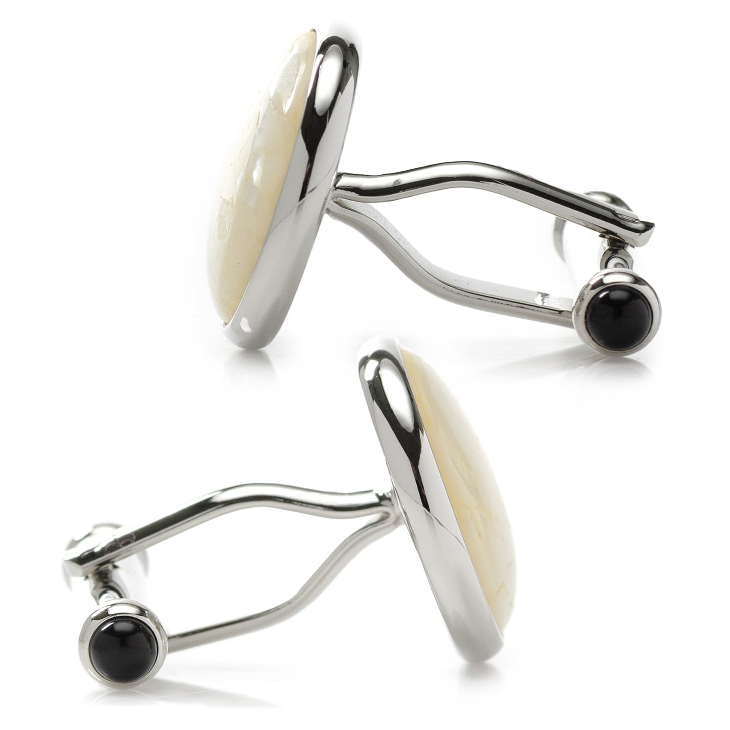 Pair of silver cufflinks with black stones on a white background