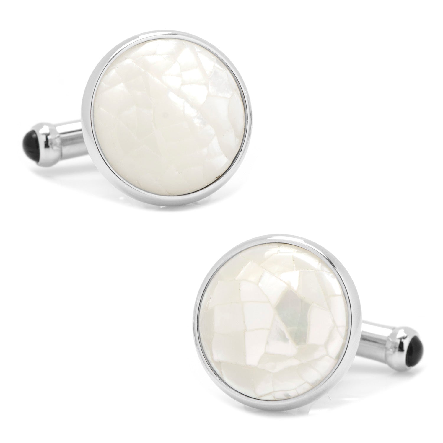 Round cufflinks with white center and silver border on a white background