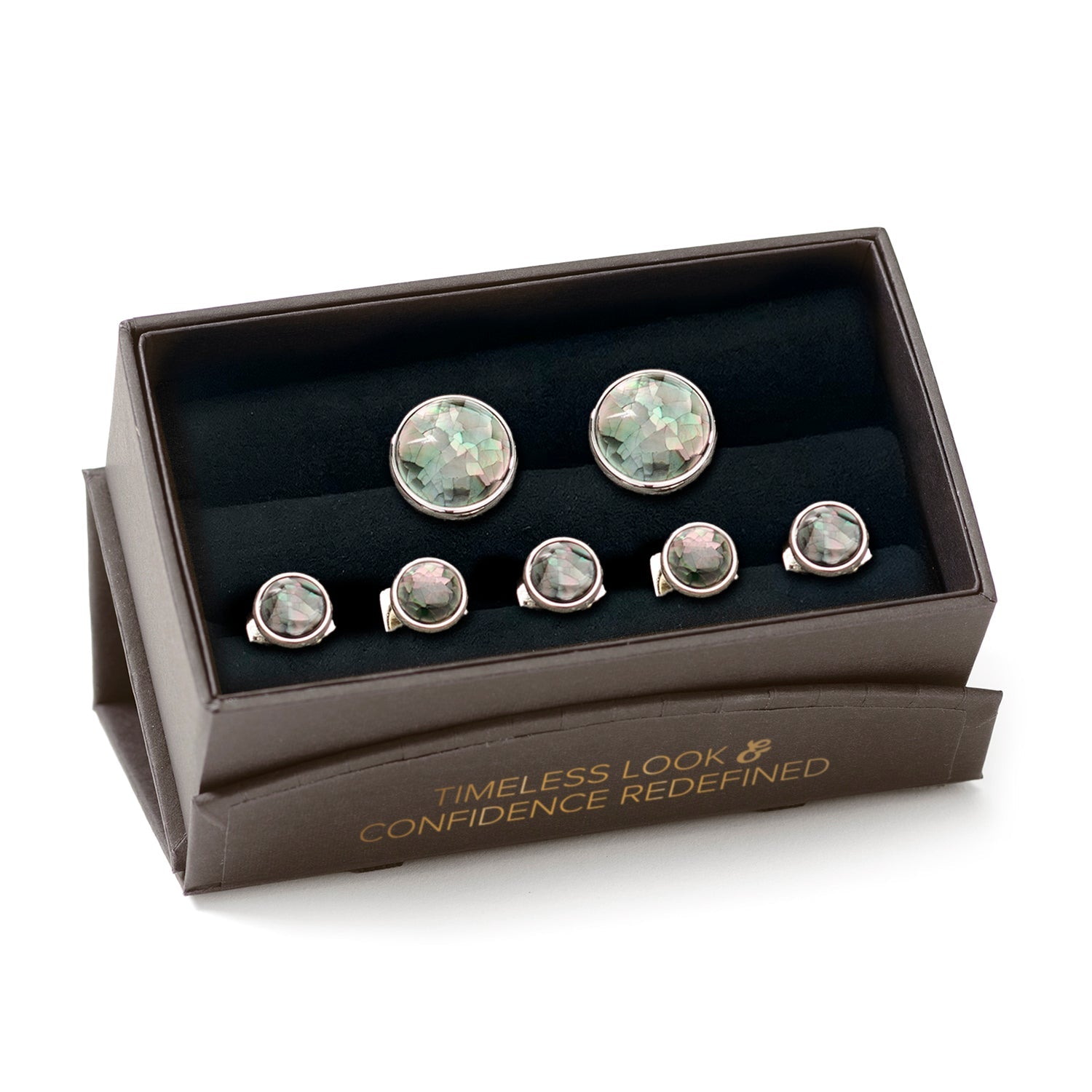 Set of cufflinks in a branded box on a white background
