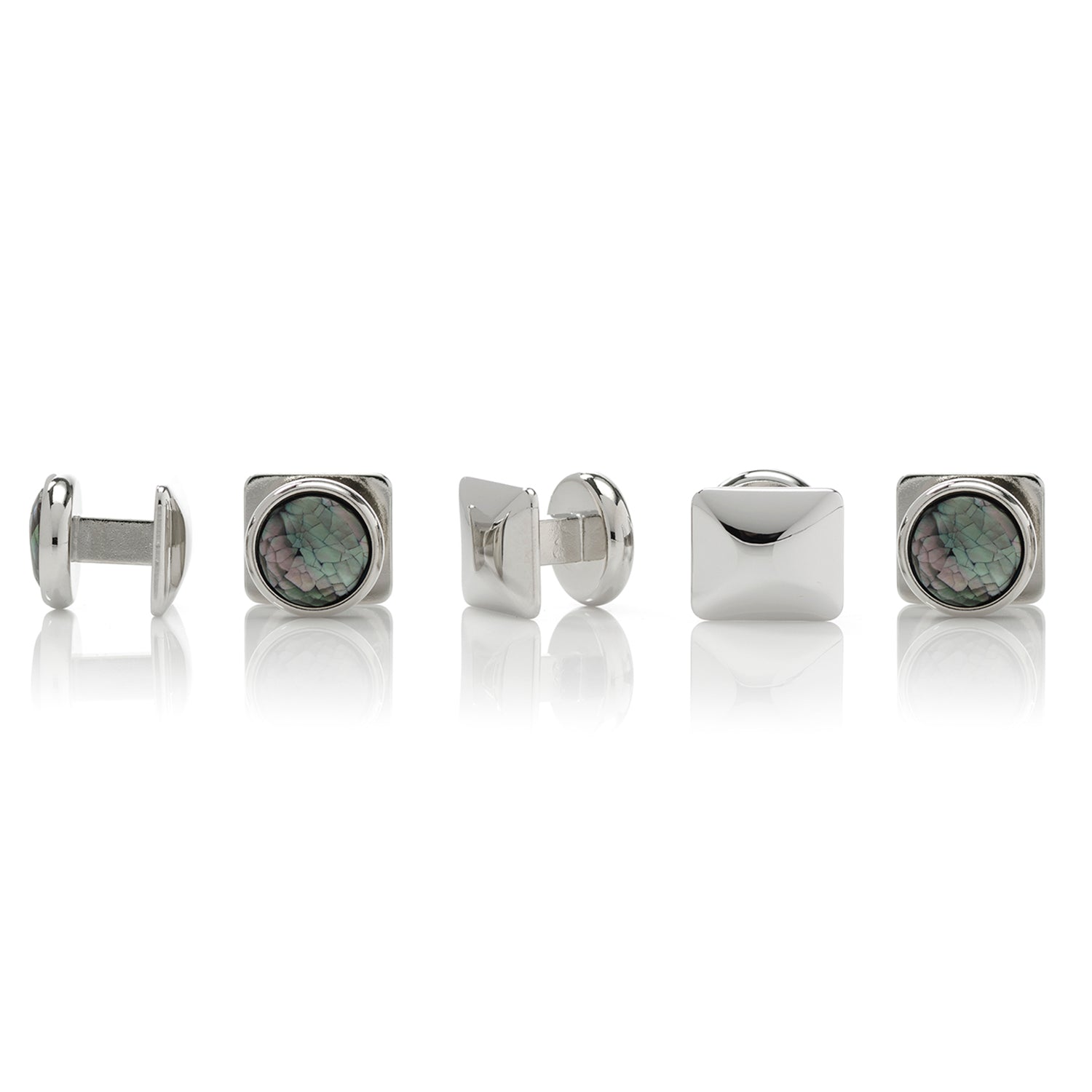 Set of silver cufflinks with green gemstones on a white background