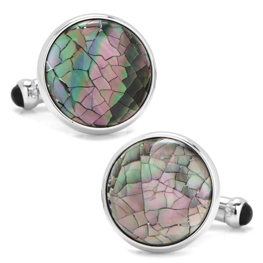 Round cufflinks with multicolored stone inlay on a white background