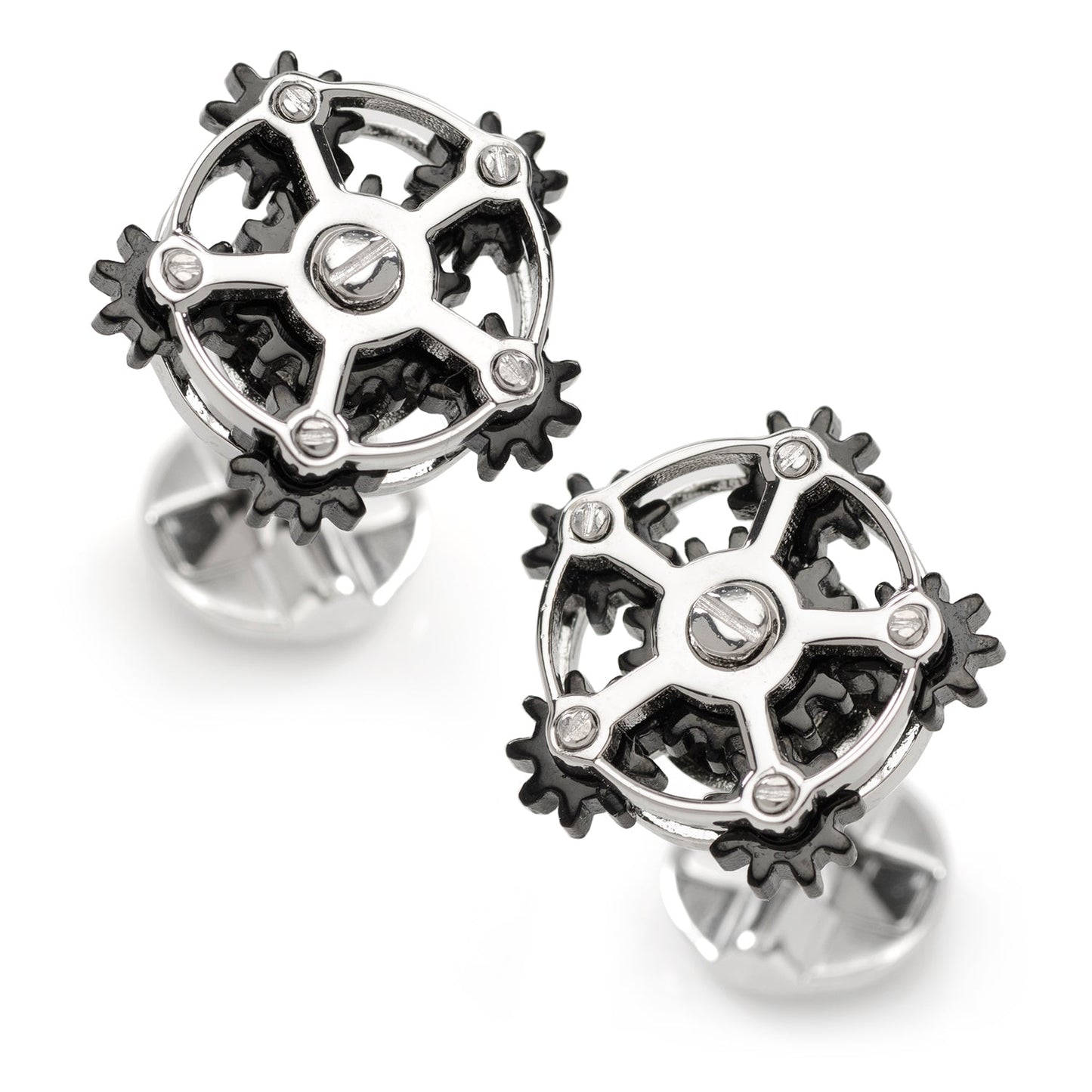 Steampunk-style gear earrings on a white background