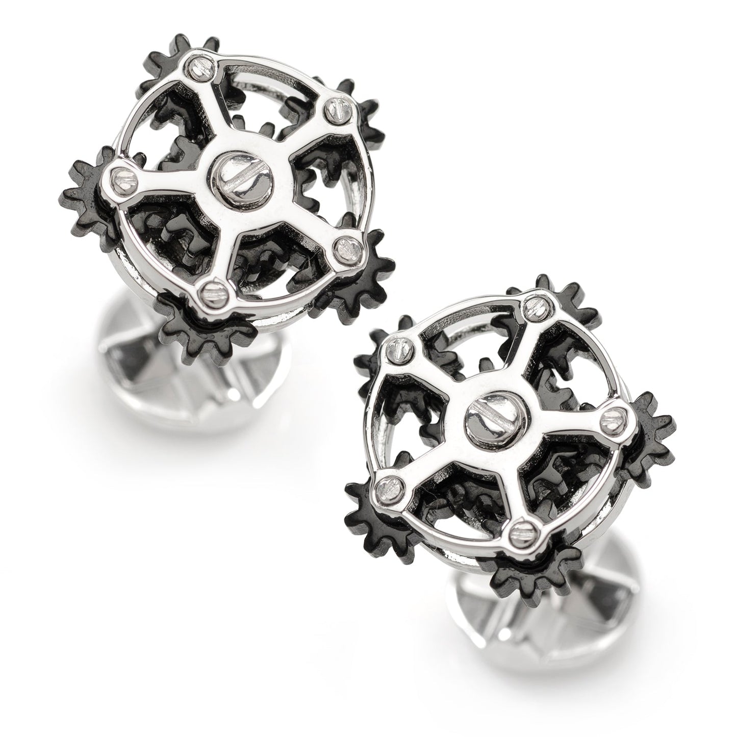 Steampunk-style gear cufflinks on a white background