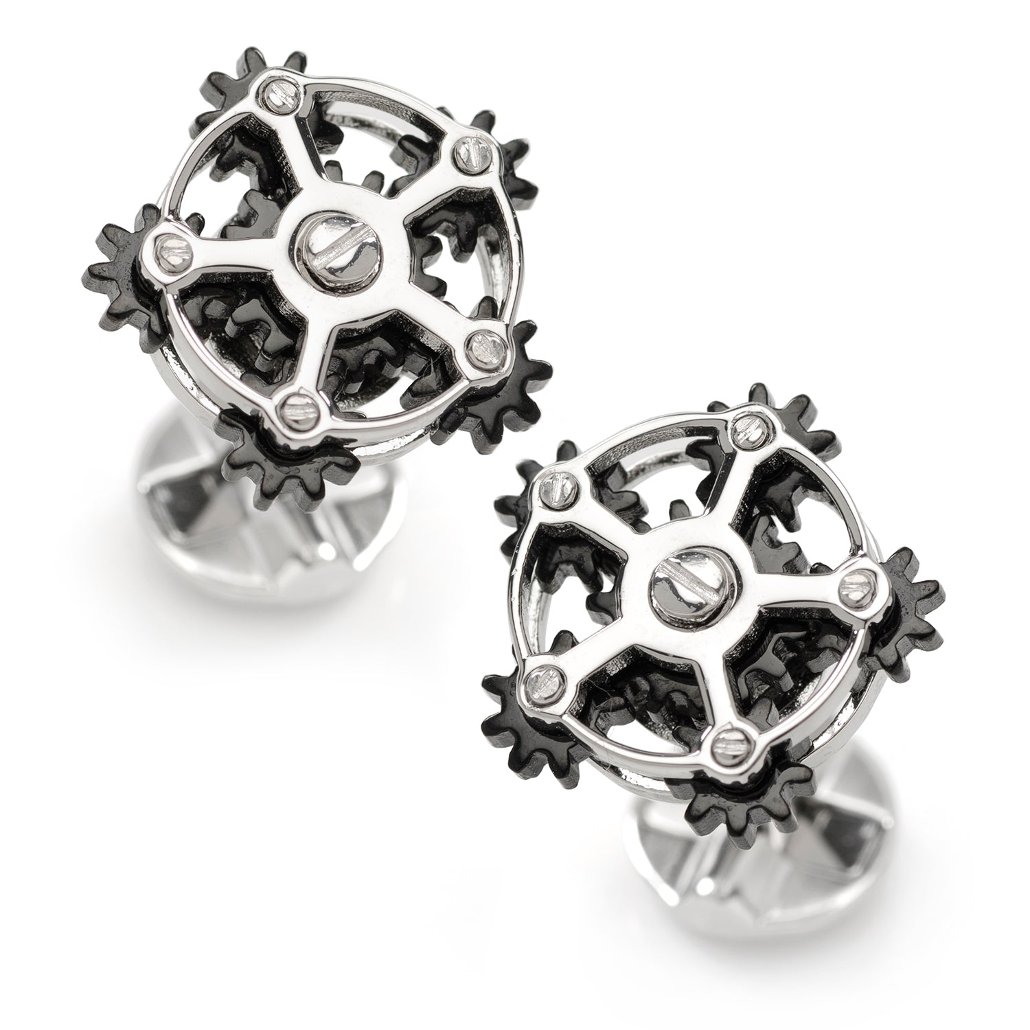 Steampunk-style gear cufflinks on a white background