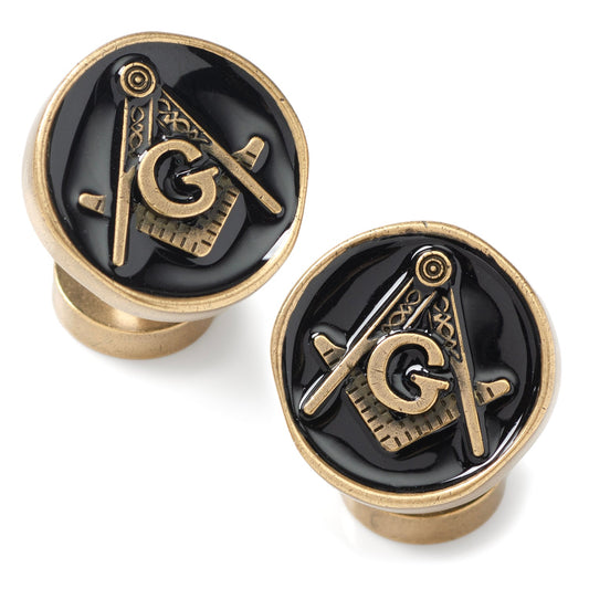 Pair of Masonic-themed cufflinks with gold and black design on a white background