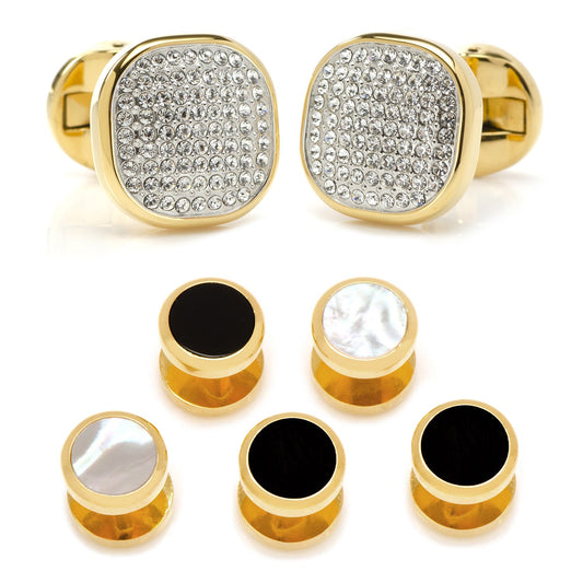 Set of gold cufflinks and tie bars with gemstone and black stone designs on a white background