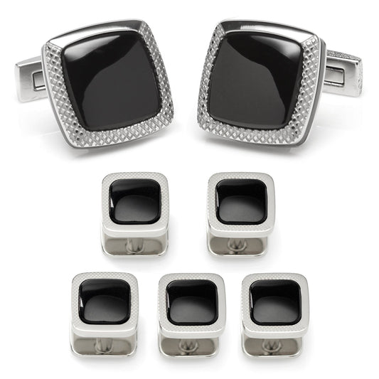 Set of black square cufflinks with silver borders on a white background