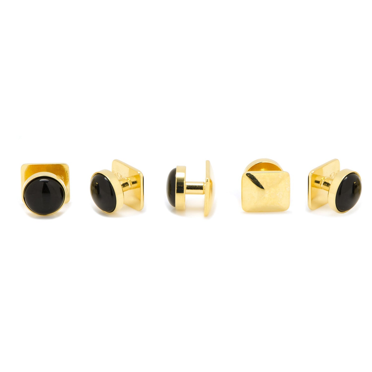 Set of gold and black earrings on a white background