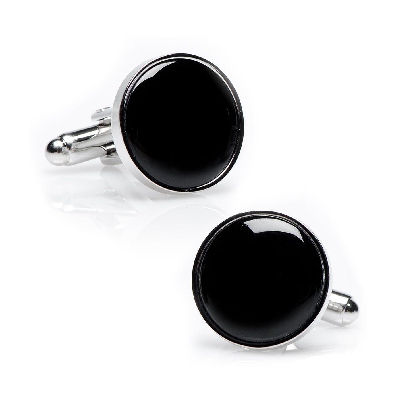 Black round cufflinks with silver borders on a white background