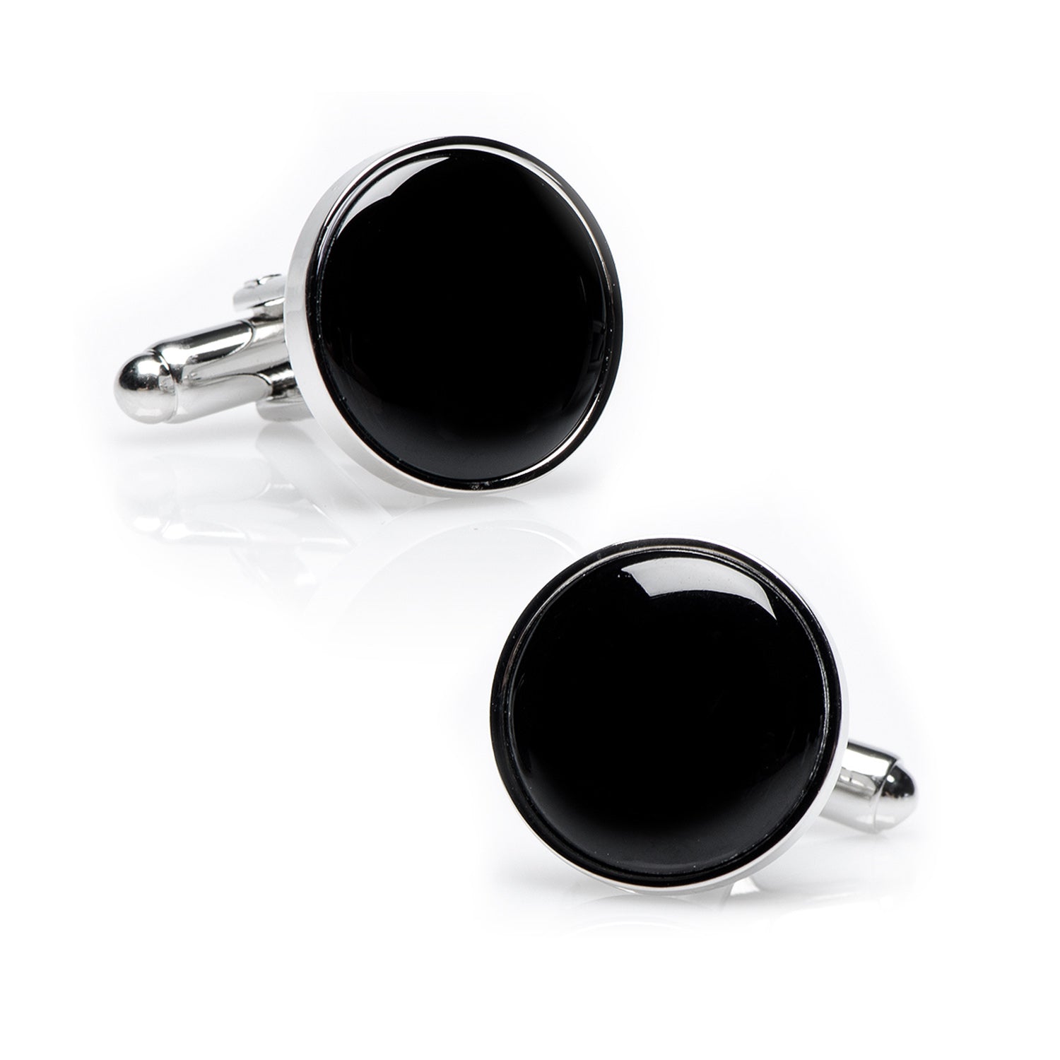 Black round cufflinks with silver borders on a white background