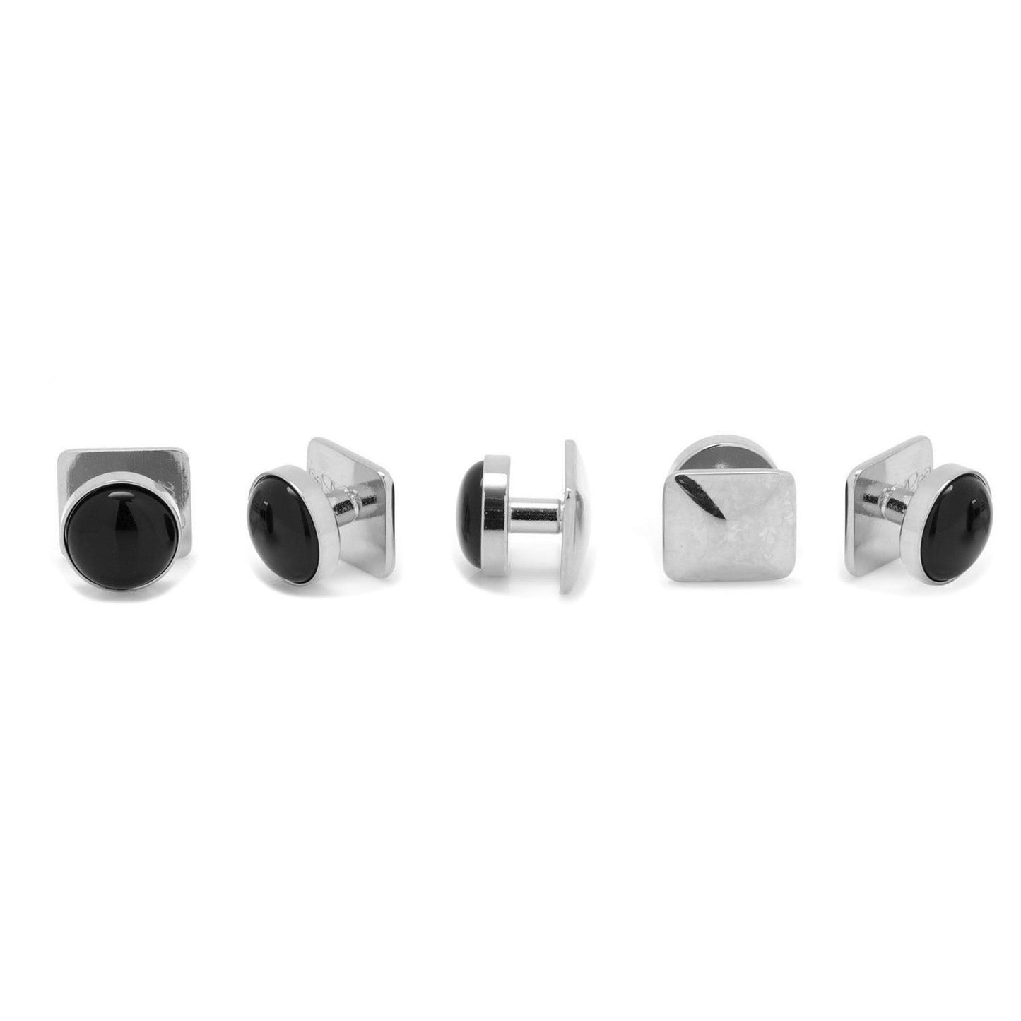Set of silver and black cufflinks on a white background