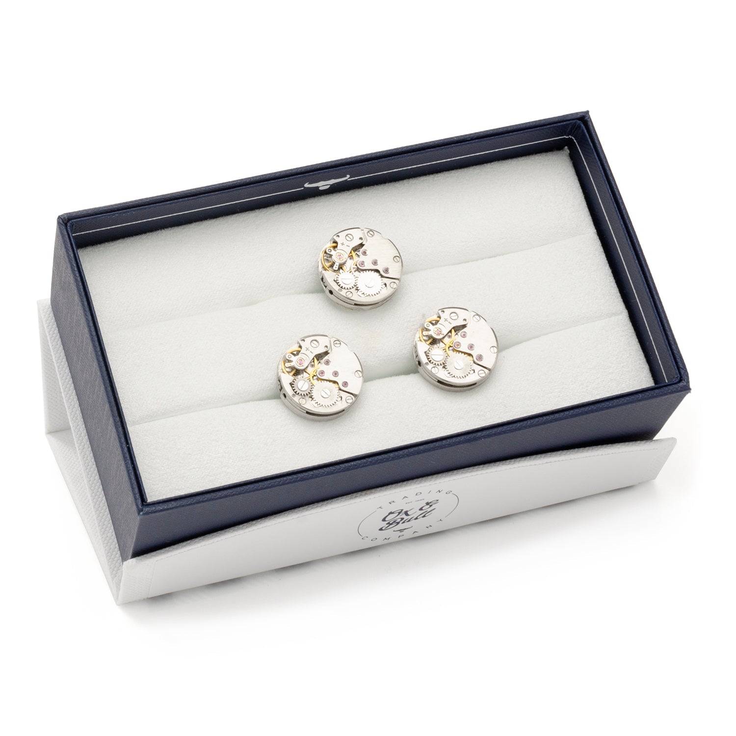 Pair of cufflinks in a jewelry box on a white background