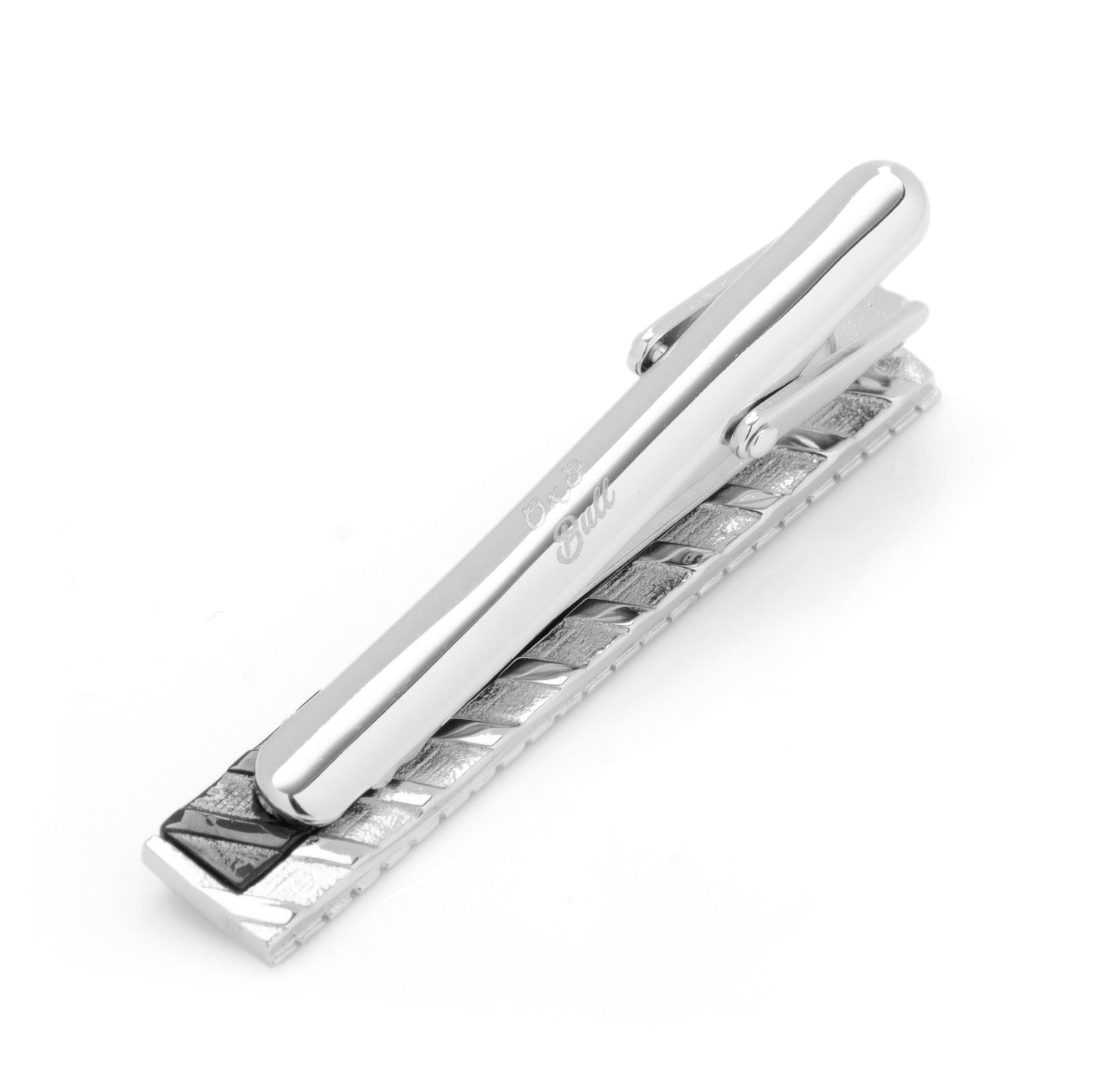 Silver tie clip with textured design on a white background