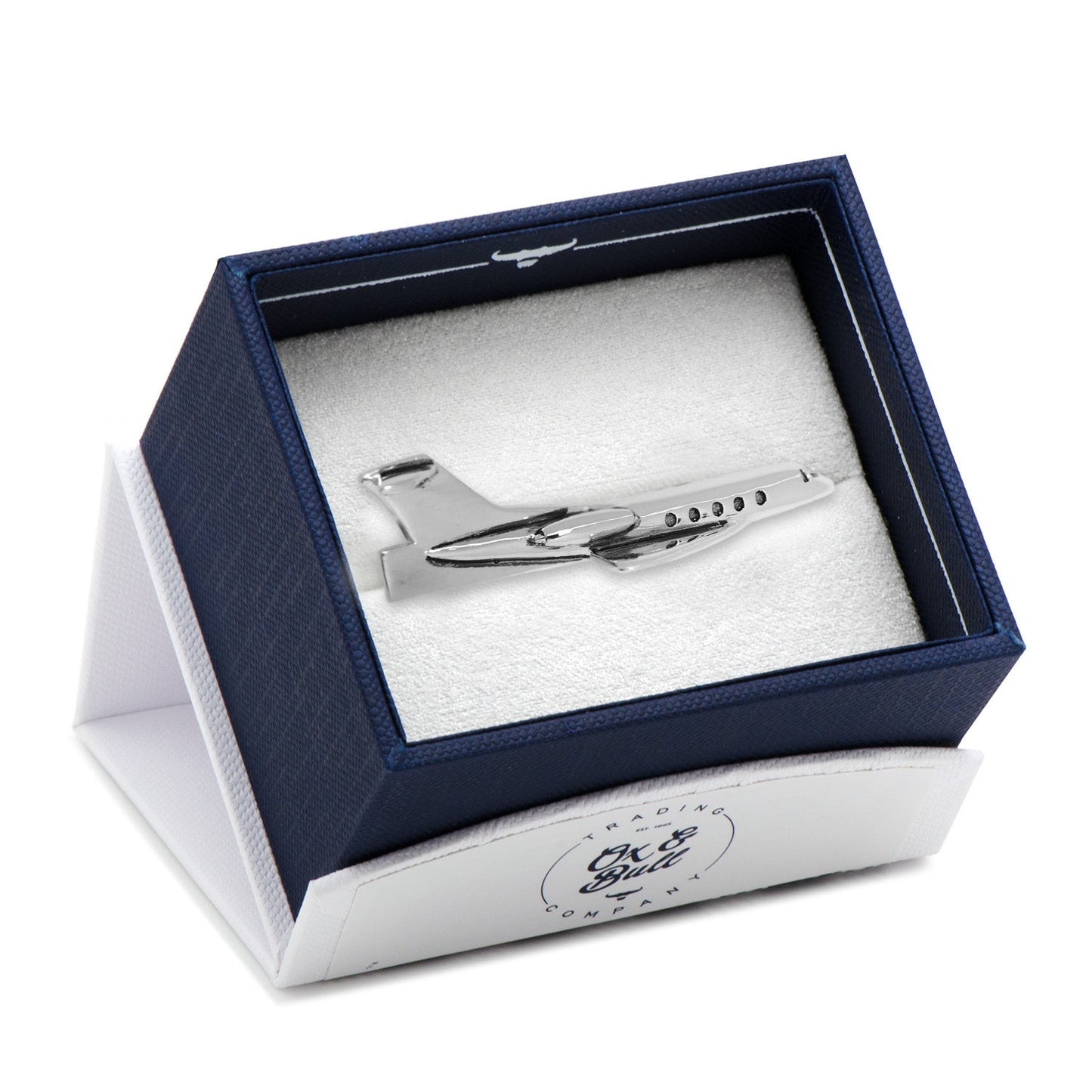 Silver airplane-shaped tie clip in a branded box on a white background