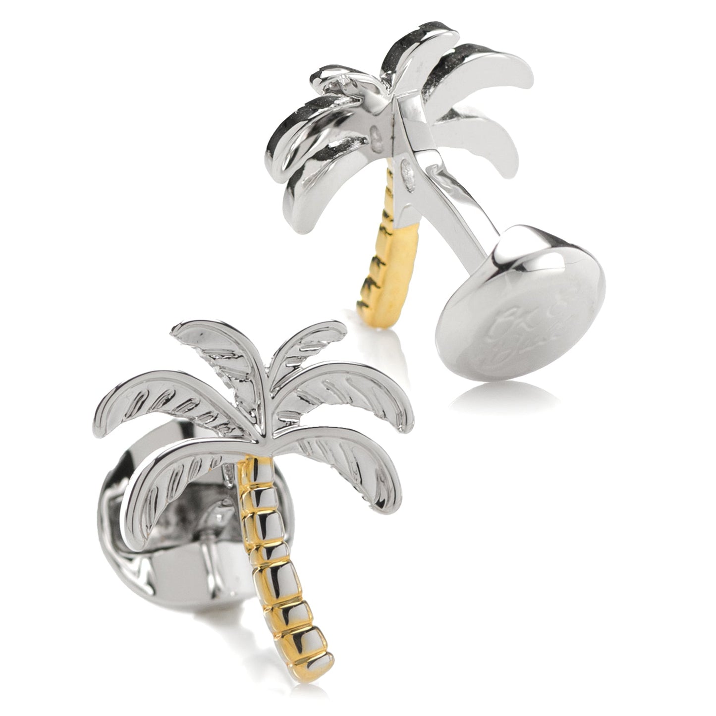 Palm tree-shaped cufflinks with gold and silver finish on a white background