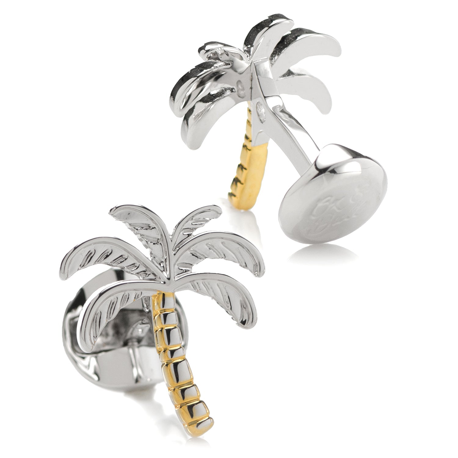 Palm tree-shaped cufflinks with gold and silver finish on a white background