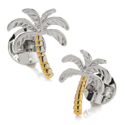 Palm tree-shaped cufflinks with gold and silver finish on a white background
