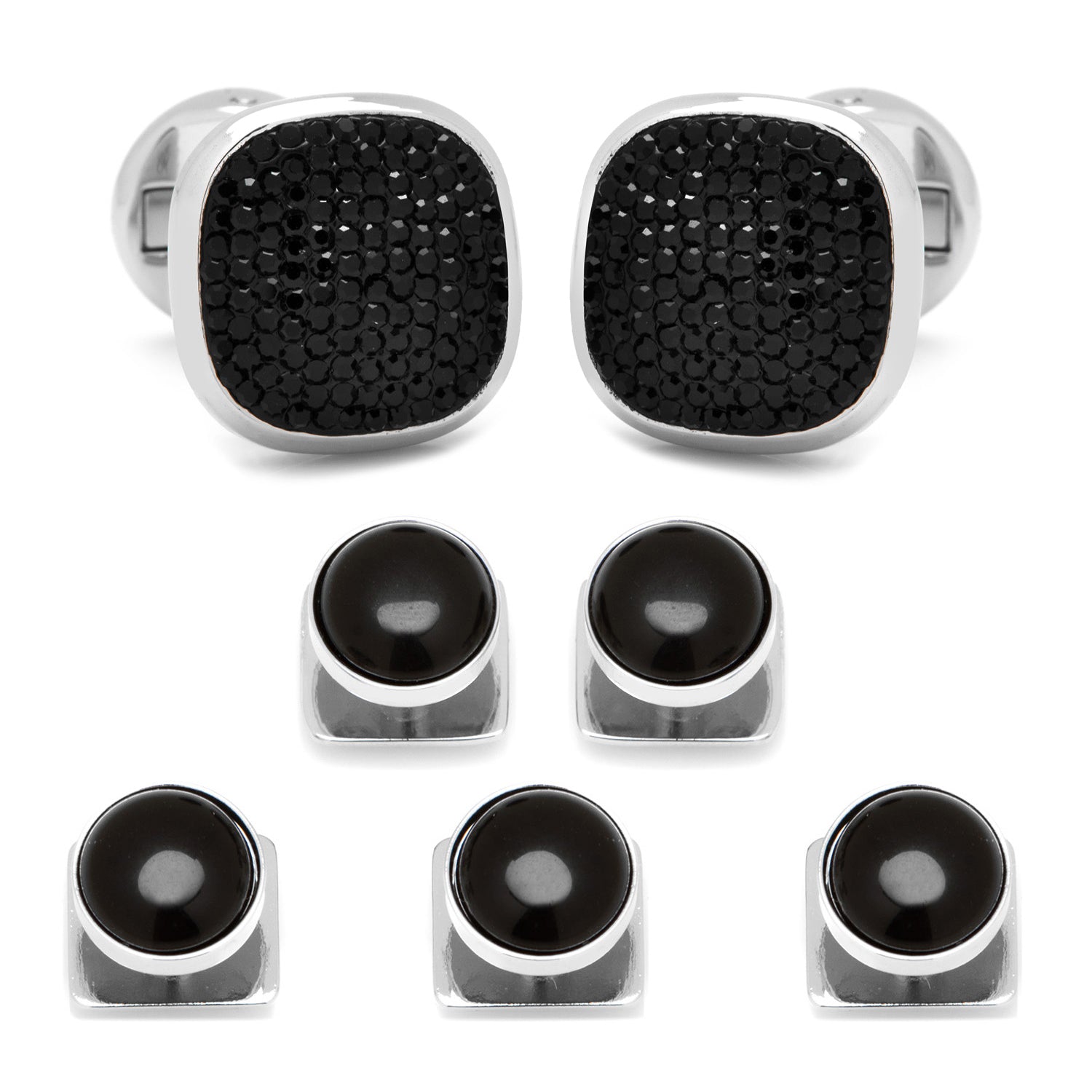 Set of black and silver cufflinks on a white background