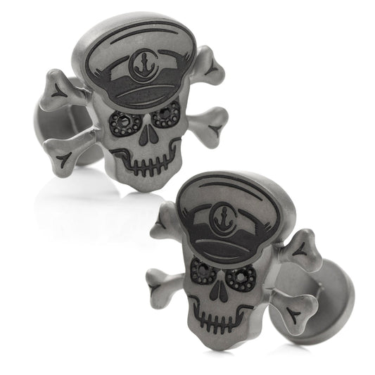 Pair of skull cufflinks with a captain's hat design on a white background