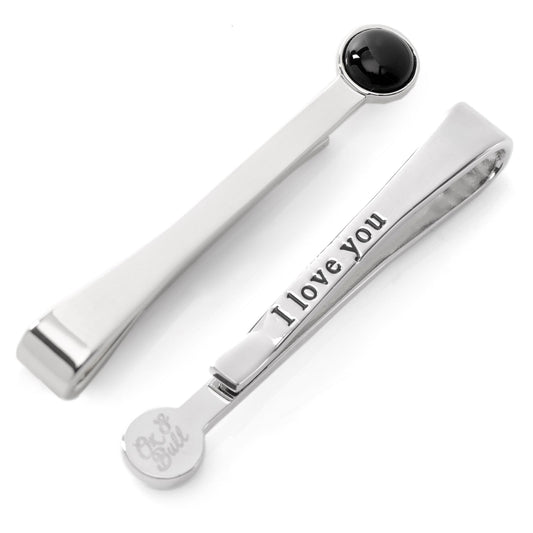 Silver pen with black cap and 'I love you' engraving on a white background