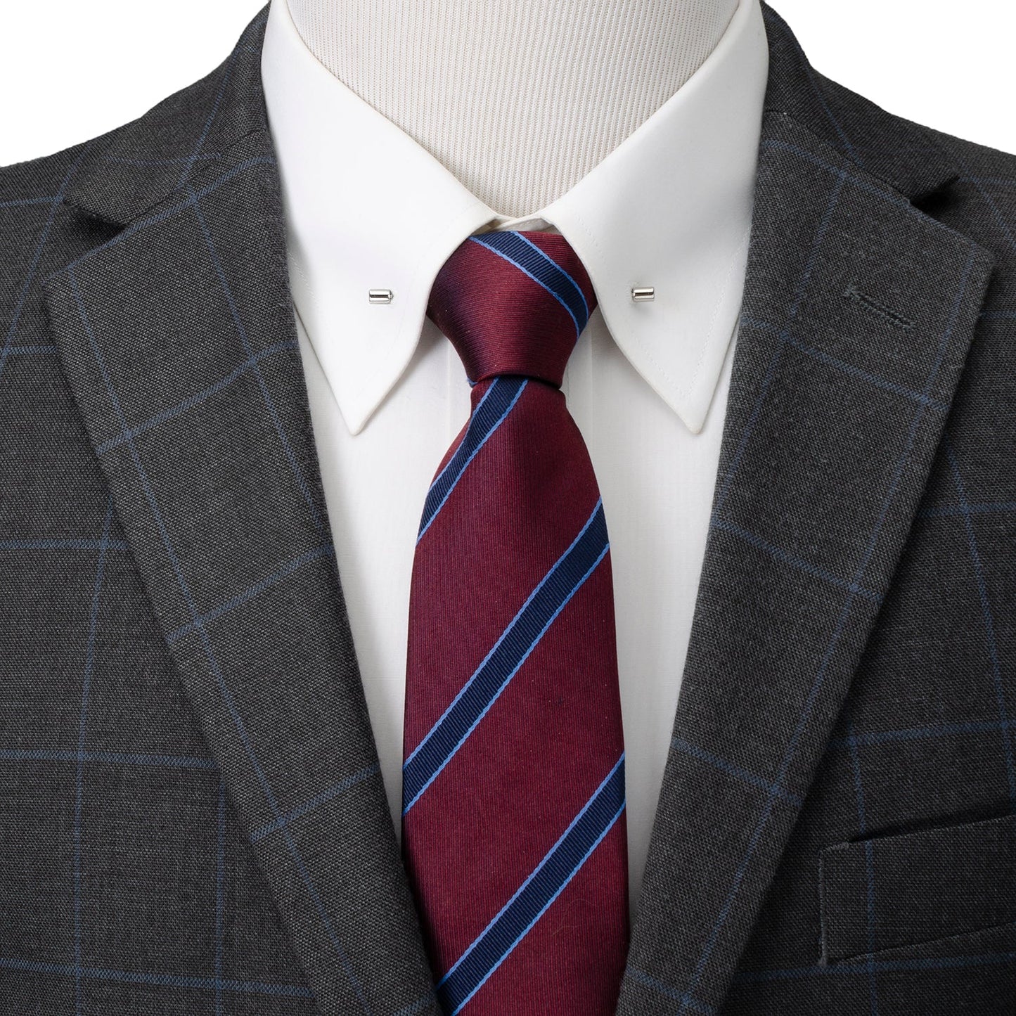 Gray checkered suit jacket with a white shirt and red striped tie on a mannequin.