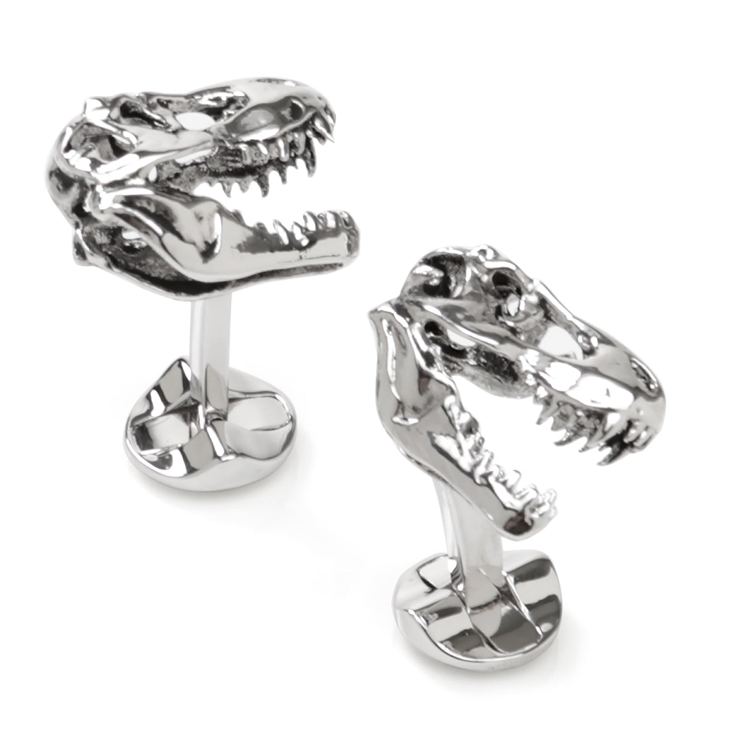 Silver dinosaur skull cufflinks on a white background