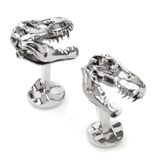 Silver dinosaur skull cufflinks on a white background