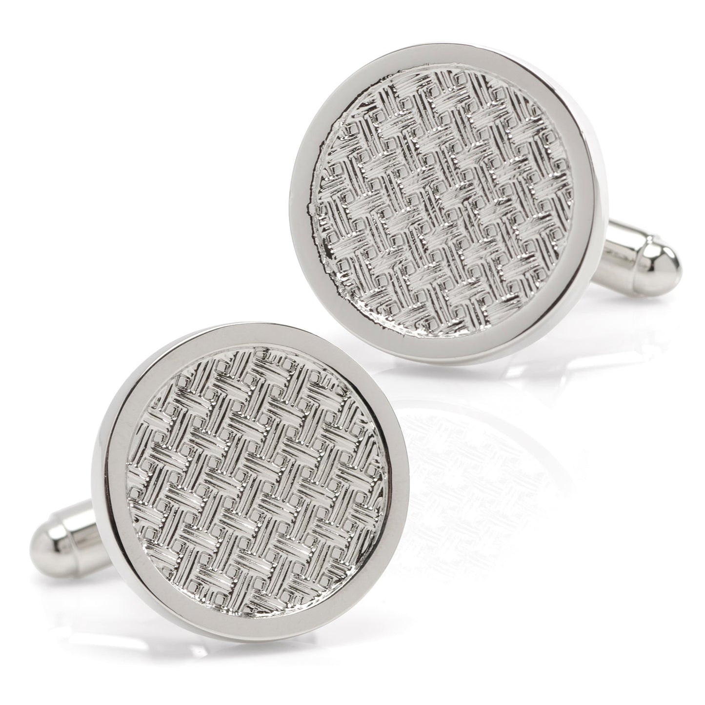 Pair of silver round cufflinks with textured pattern on a white background