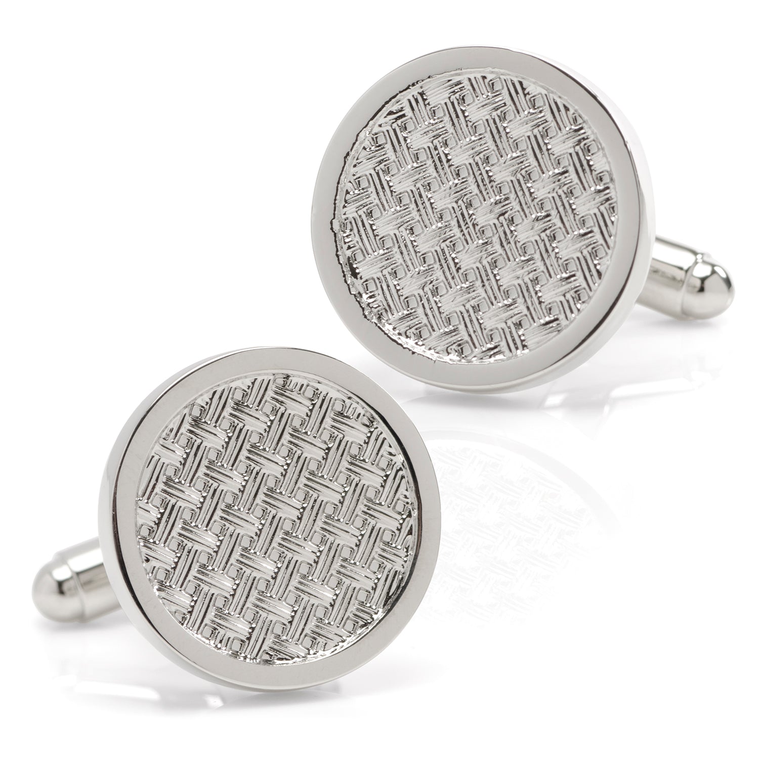 Pair of silver round cufflinks with textured pattern on a white background
