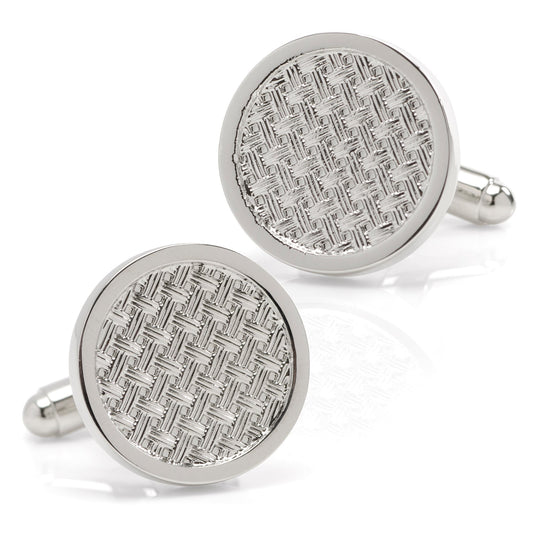 Pair of silver round cufflinks with textured pattern on a white background