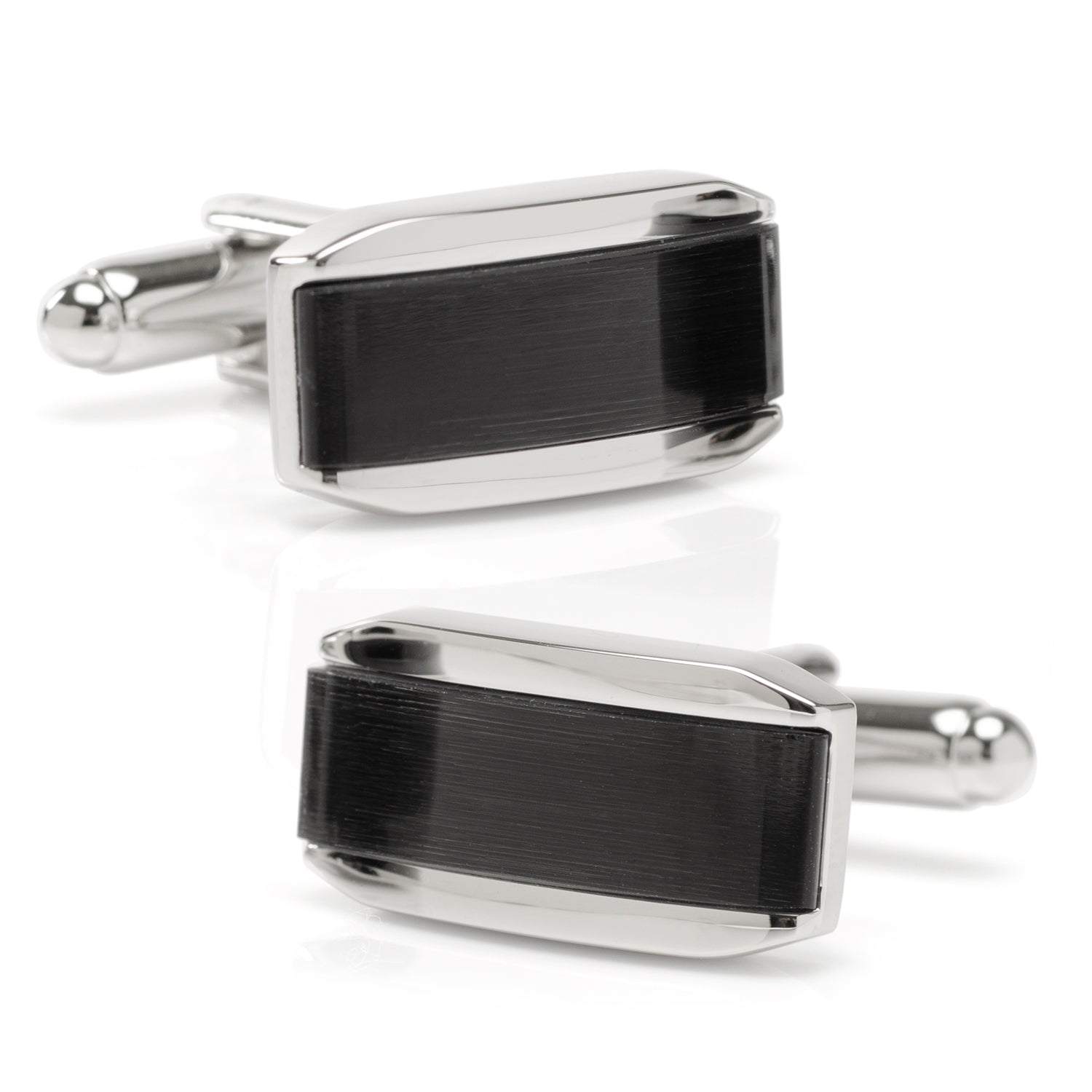 Pair of black and silver rectangular cufflinks on a white background