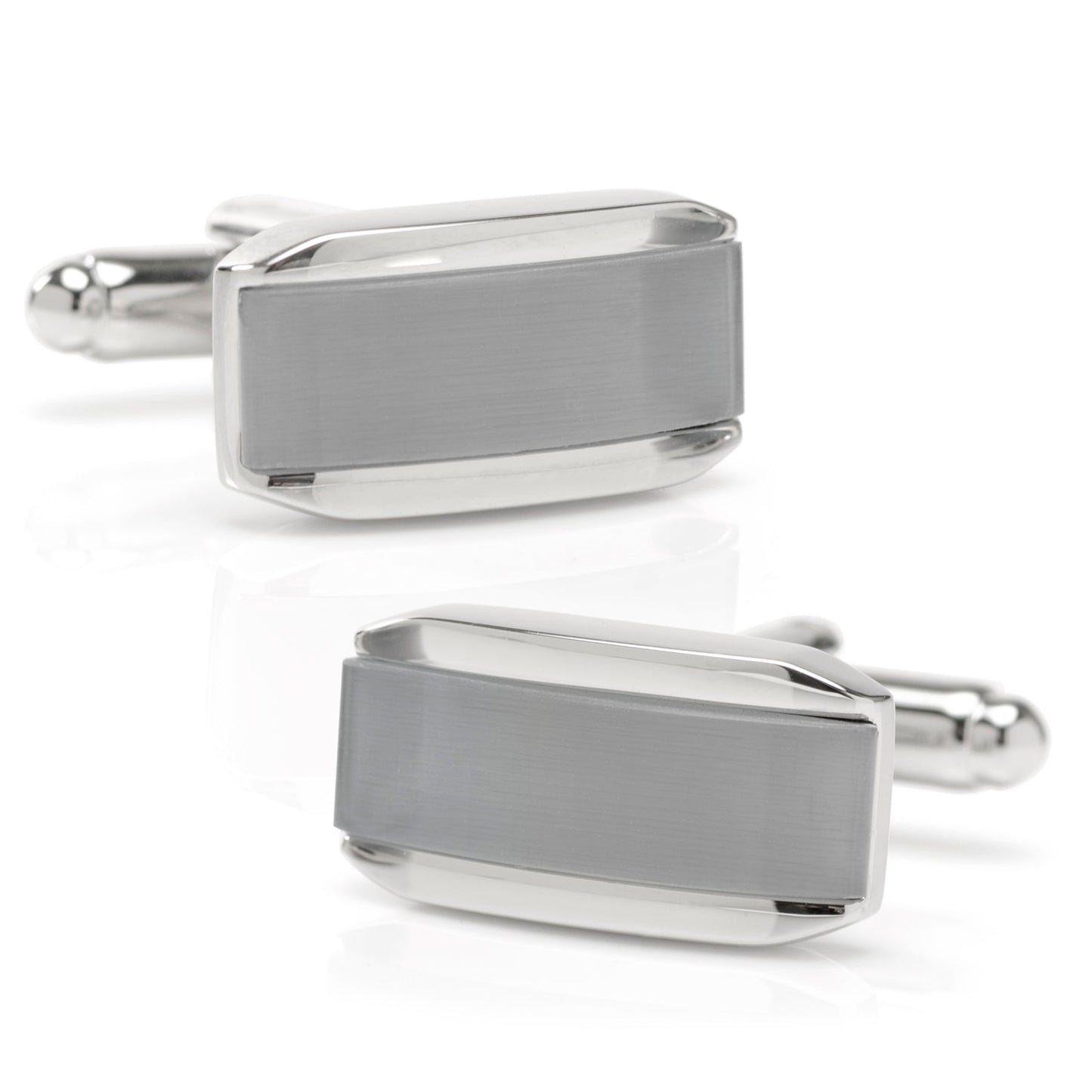Pair of silver rectangular cufflinks on a white background