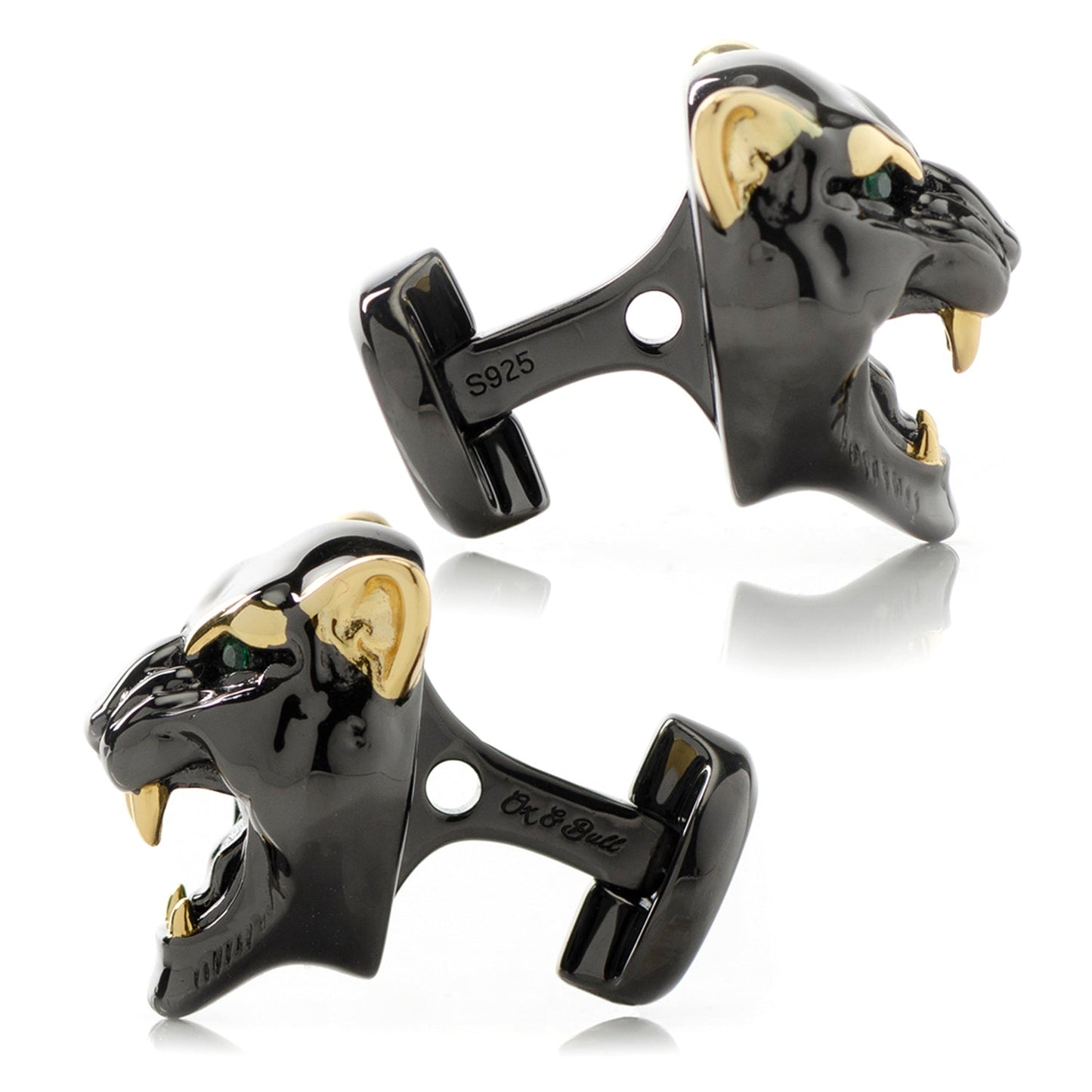 Black panther cufflinks with gold accents on a white background
