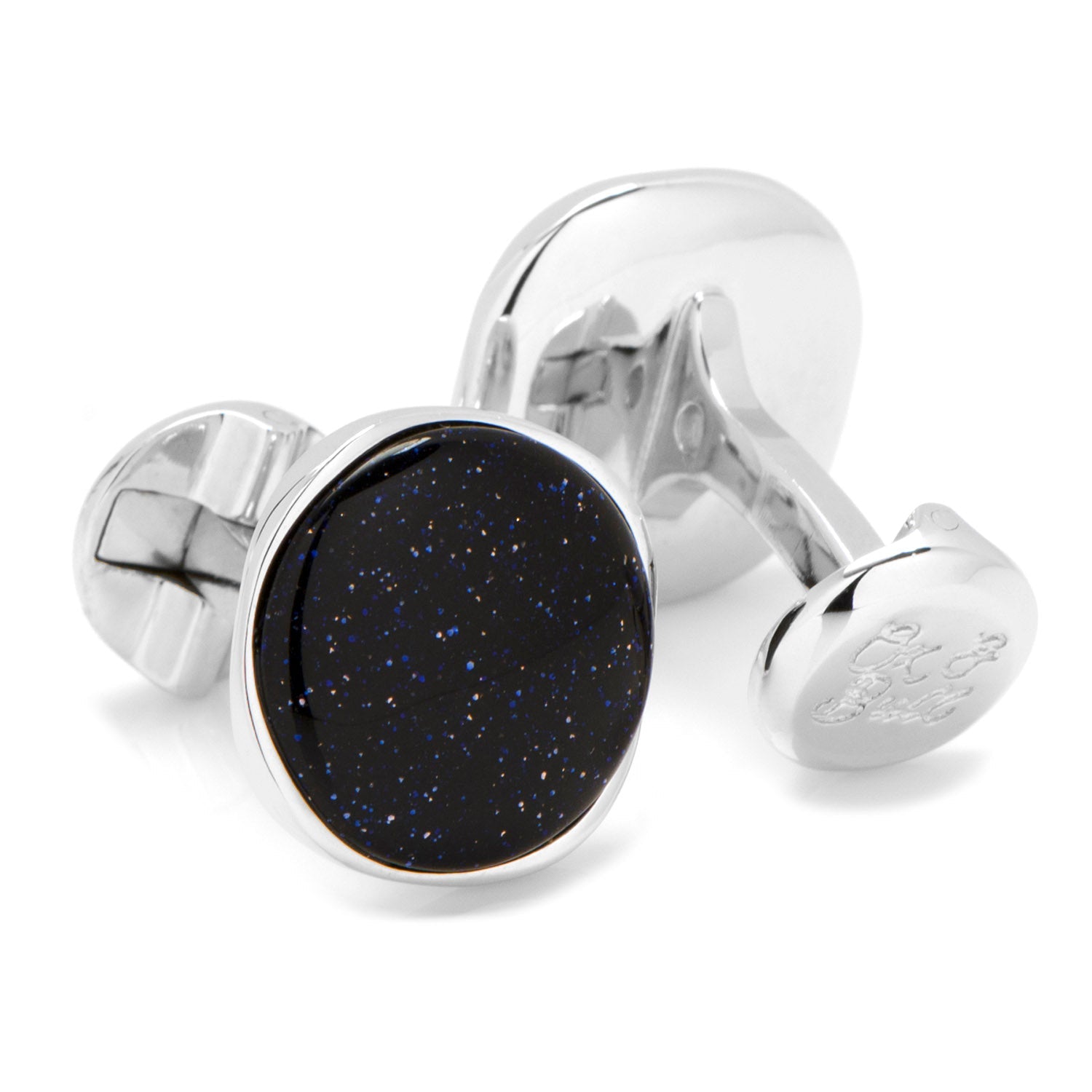 Silver cufflinks with a black stone on a white background