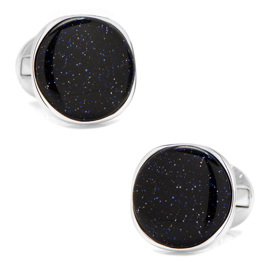 Round cufflinks with black stone center and silver metal frame on a white background