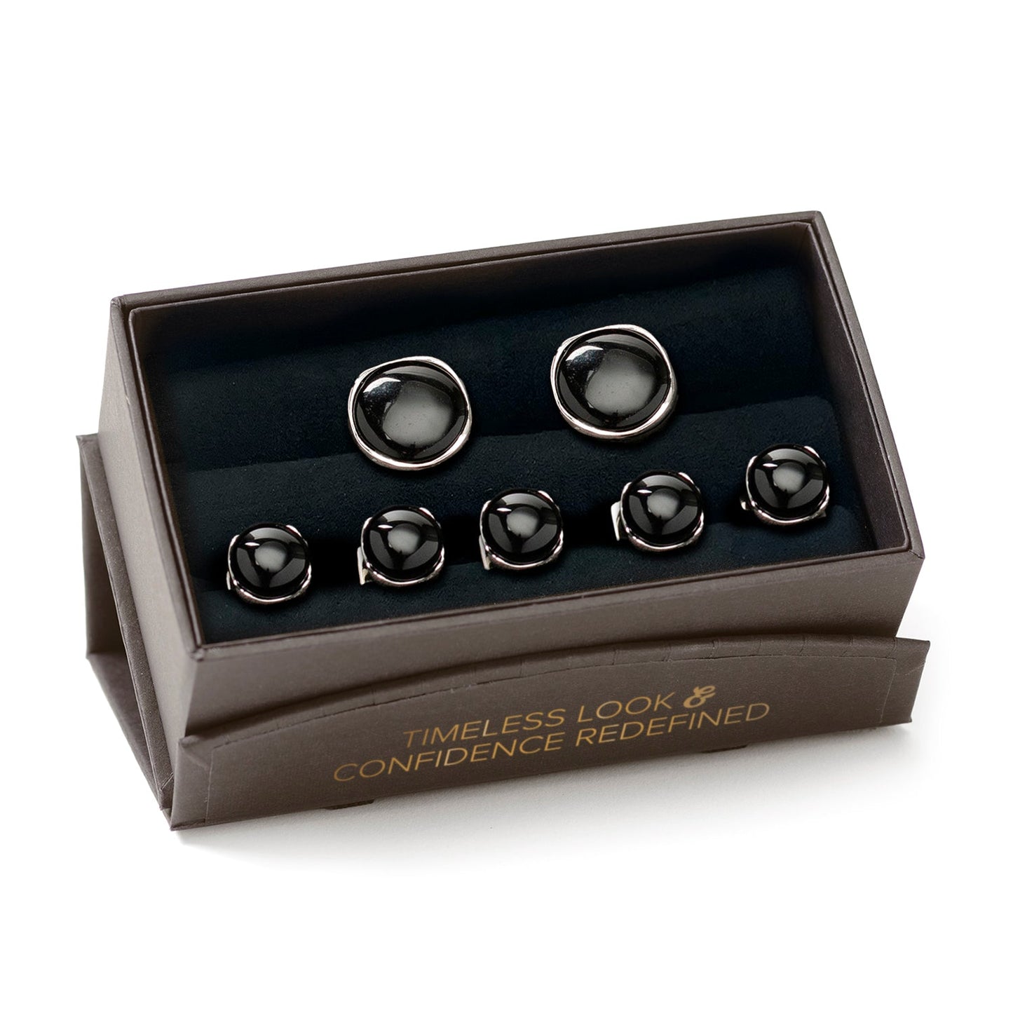 Set of black and silver cufflinks in a branded box on a white background