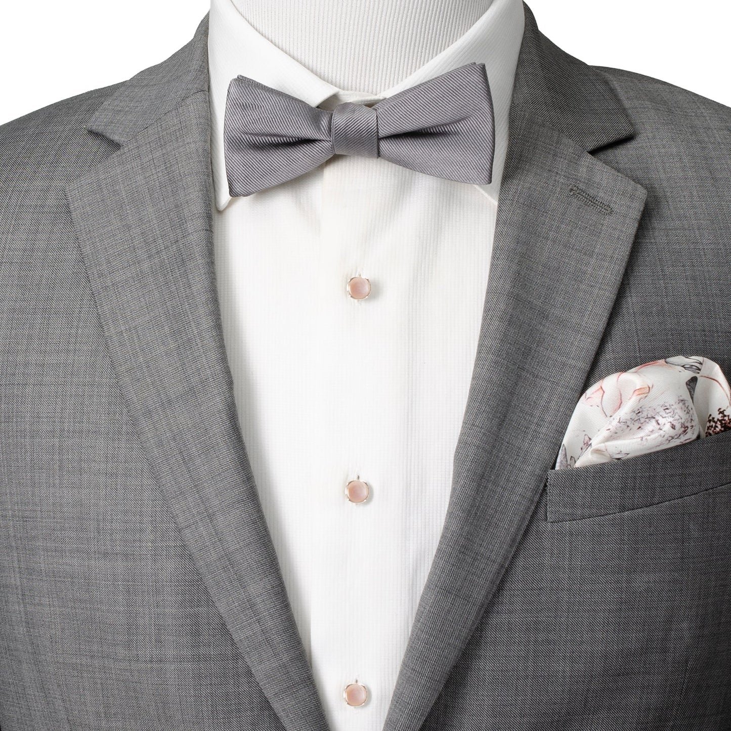 Gray suit with a bow tie and pocket square on a mannequin