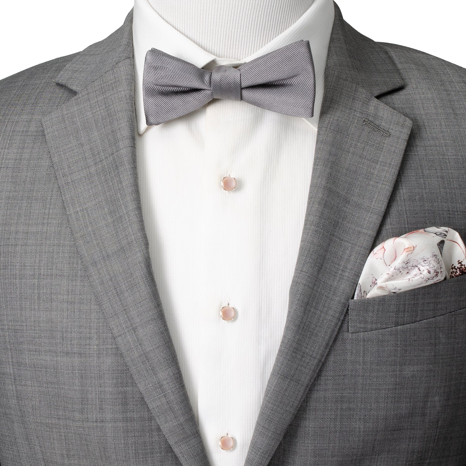 Gray suit with a bow tie and pocket square on a mannequin
