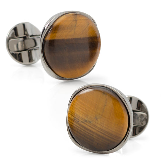Pair of tiger eye stone cufflinks with silver metal accents on a white background