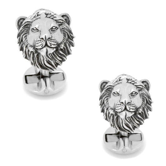 Silver lion head cufflinks on a white background
