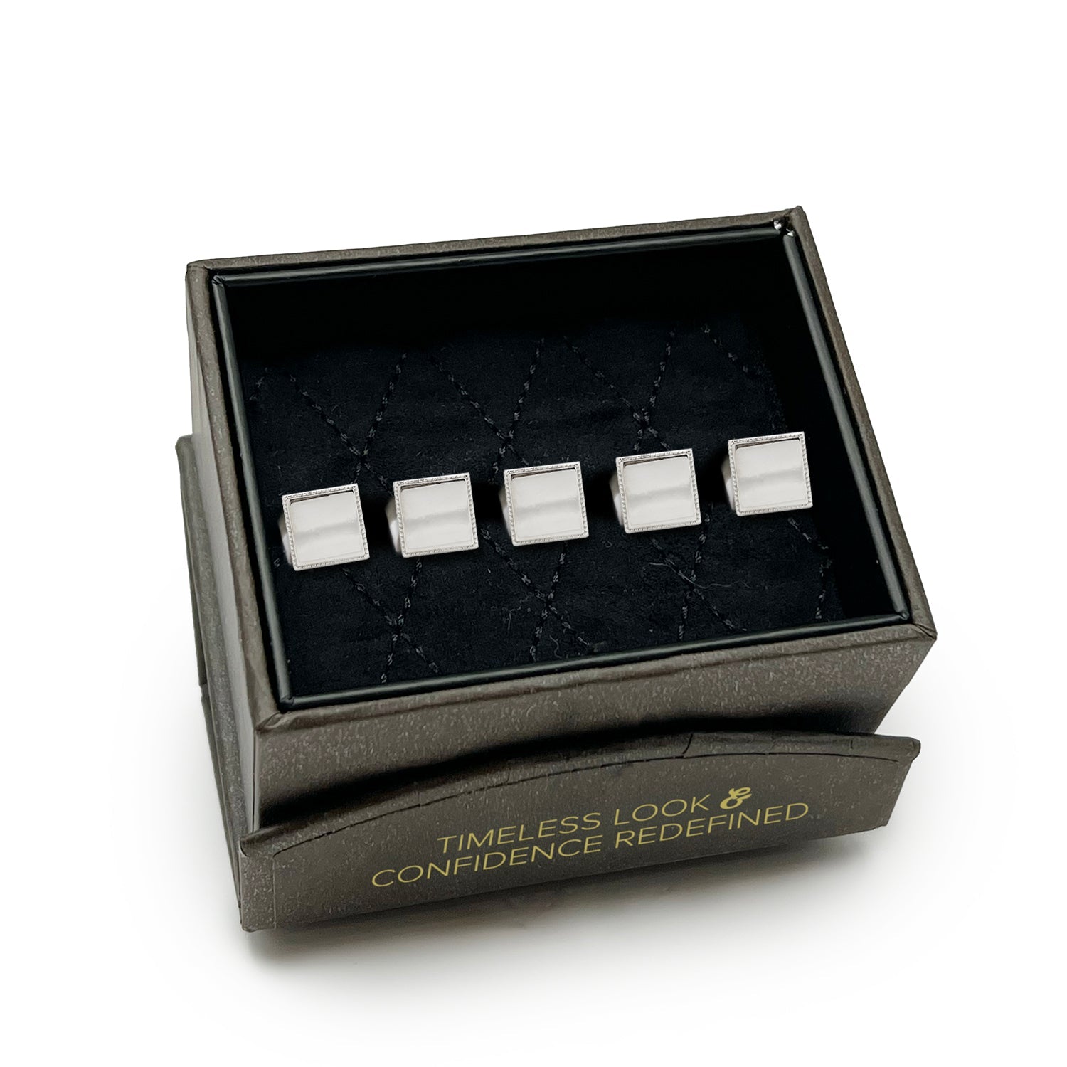 Set of silver cufflinks in a black box with text on a white background