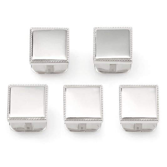 Set of five square silver napkin holders on a white background